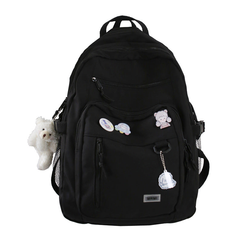 Sac à dos grande capacité pour filles et étudiantes, imperméable, multi-poches, bretelles confortables. Disponible en 4 coloris. Idéal pour l'école et le quotidien.