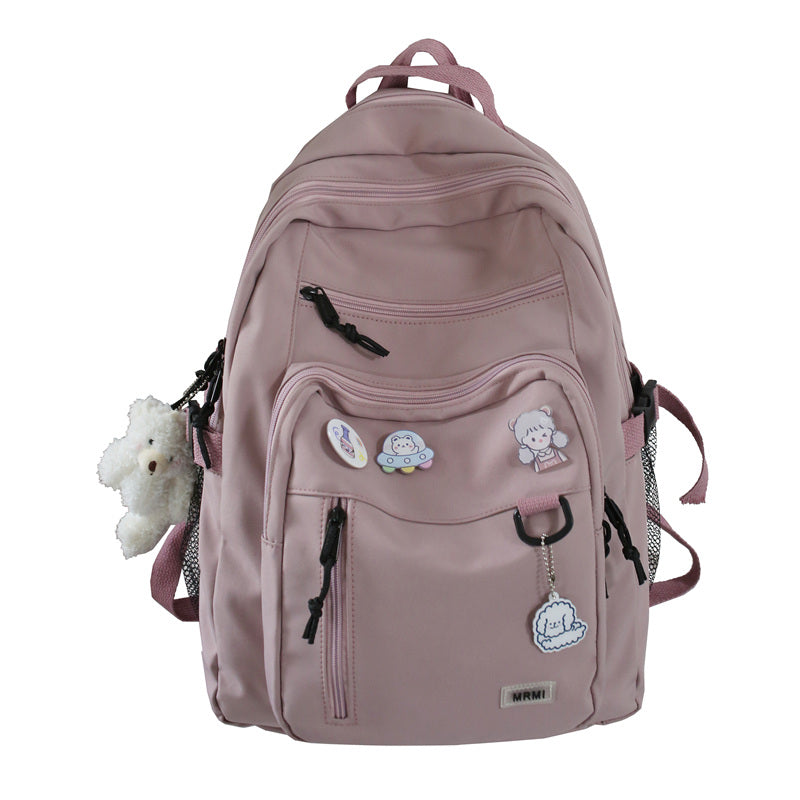 Sac à dos grande capacité pour filles et étudiantes, imperméable, multi-poches, bretelles confortables. Disponible en 4 coloris. Idéal pour l'école et le quotidien.