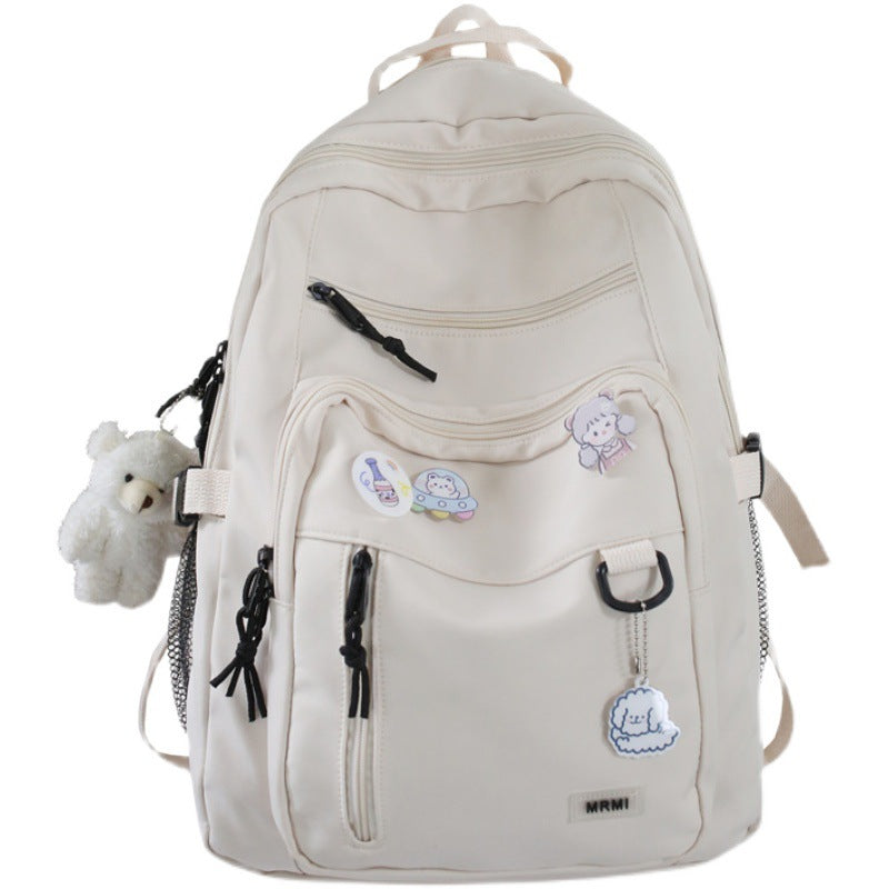 Sac à dos grande capacité pour filles et étudiantes, imperméable, multi-poches, bretelles confortables. Disponible en 4 coloris. Idéal pour l'école et le quotidien.