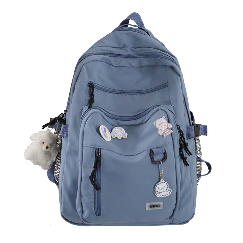 Sac à dos grande capacité pour filles et étudiantes, imperméable, multi-poches, bretelles confortables. Disponible en 4 coloris. Idéal pour l'école et le quotidien.