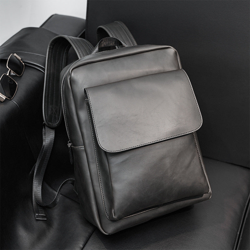 Sac à dos homme style coréen vintage, cuir Crazy Horse, grande capacité 20-35L, imperméable. Idéal travail, études et voyages. Disponible en Noir et Marron.