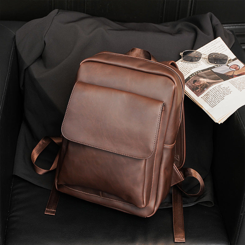 Sac à dos homme style coréen vintage, cuir Crazy Horse, grande capacité 20-35L, imperméable. Idéal travail, études et voyages. Disponible en Noir et Marron.